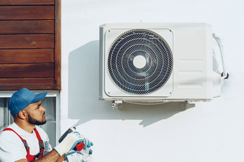 rsz repairman in uniform installing the outside unit o 2023 11 27 04 55 29 utc